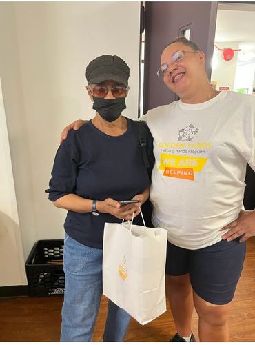 Kowal House resident  with a GYHH volunteer in July 2022