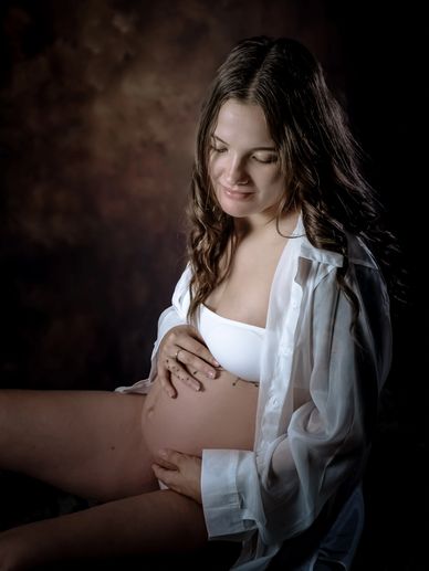 Cannock Maternity Photography lady holding pregnancy bump photo