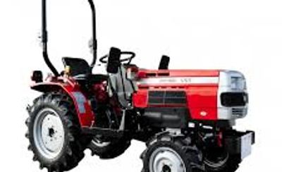 Red compact tractor with rugged tires and open driver's seat.