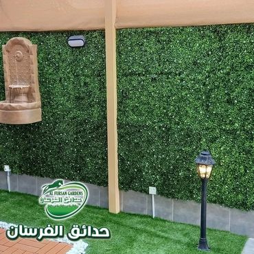 عشب جداري وشلال - تنسيق حدائق الرياض- تنسيق حدائق جدة - تنسيق حدائق الدمام - تنسيق حدائق خميس مشيط  
