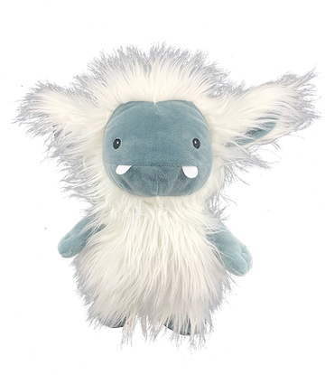 Fluffy blue and white monster plush toy.