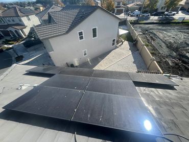 Solar panels covered in dirt and bird droppings before cleaning.