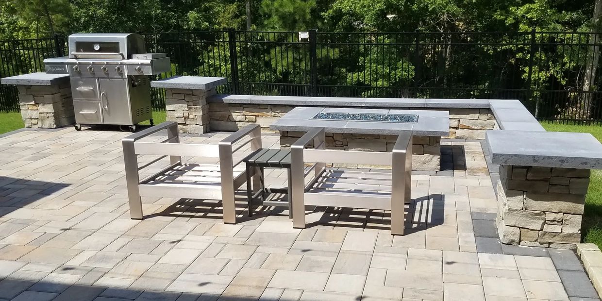 Paver Patio with seating walls, grilling area, and gas fire pit