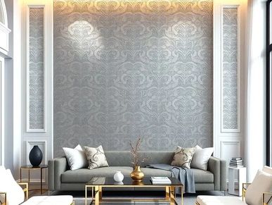 Elegant living room with grey sofa and decorative wall.