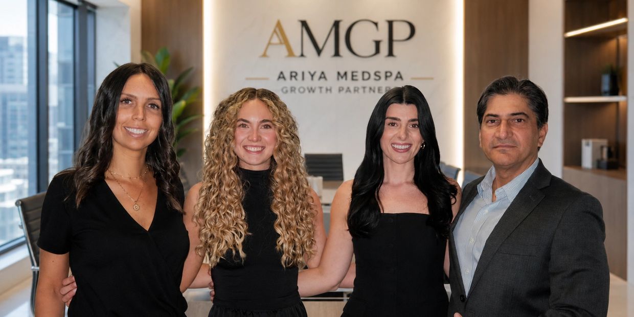 Four professionals posing at Ariya MedSpa Growth Partners.