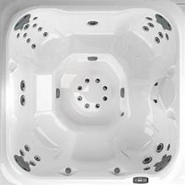 White square hot tub with multiple seating and jets.