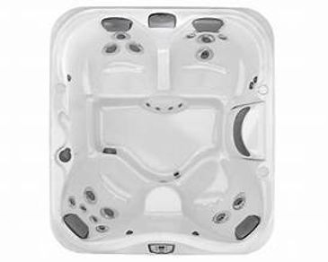 Top view of a white luxury hot tub with multiple seats and jets.