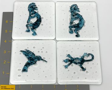 kokopelli, lizard, hummingbird in fused glass coasters