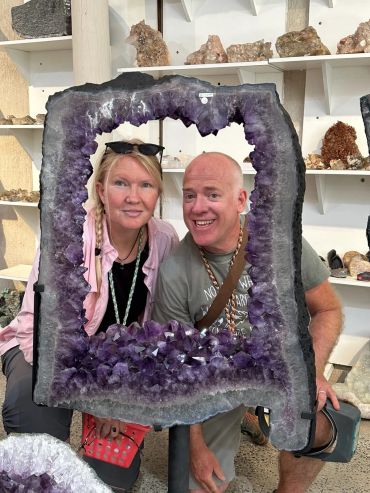 Crystal vendors displaying gemstones, crystals, fossils, and mineral specimens at Sandy Utah event