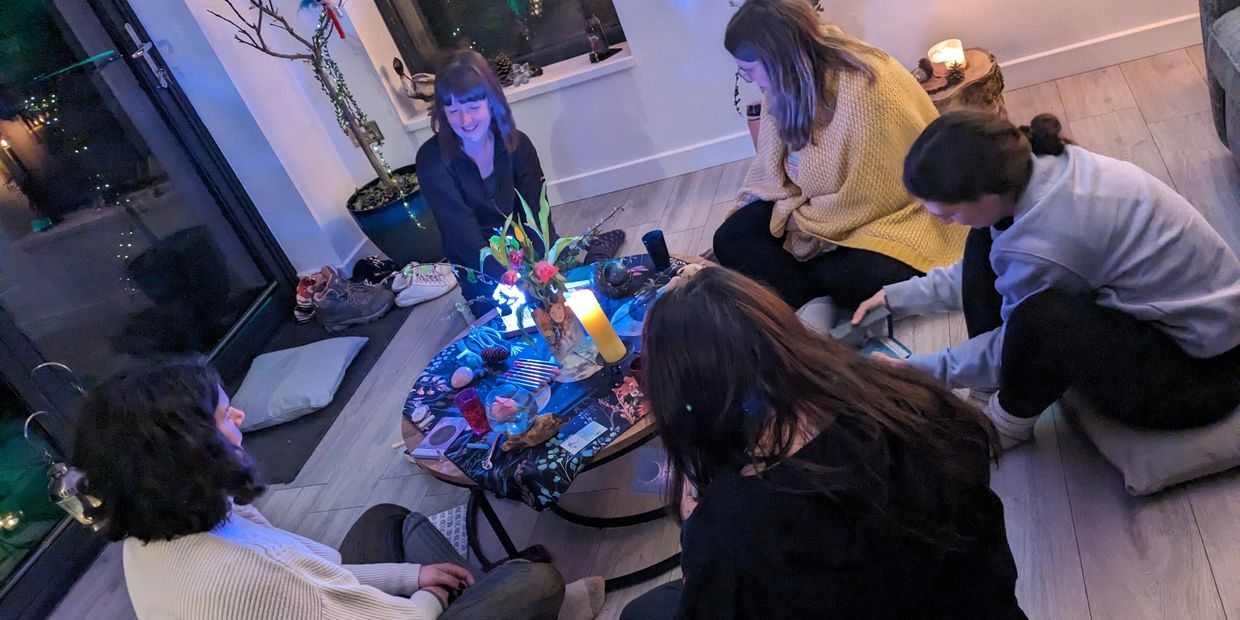 Women in circle.
Women laughing together.
Women crafting.
Witches in circle.