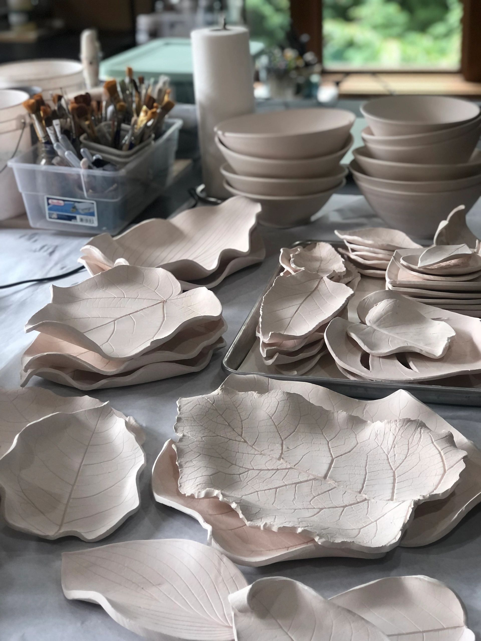 After the first firing, the bisque ware is ready to be glazed.