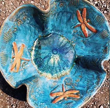 Presque Isle State Park’s Tom Ridge Environmental Center requested pottery art that would be a souve