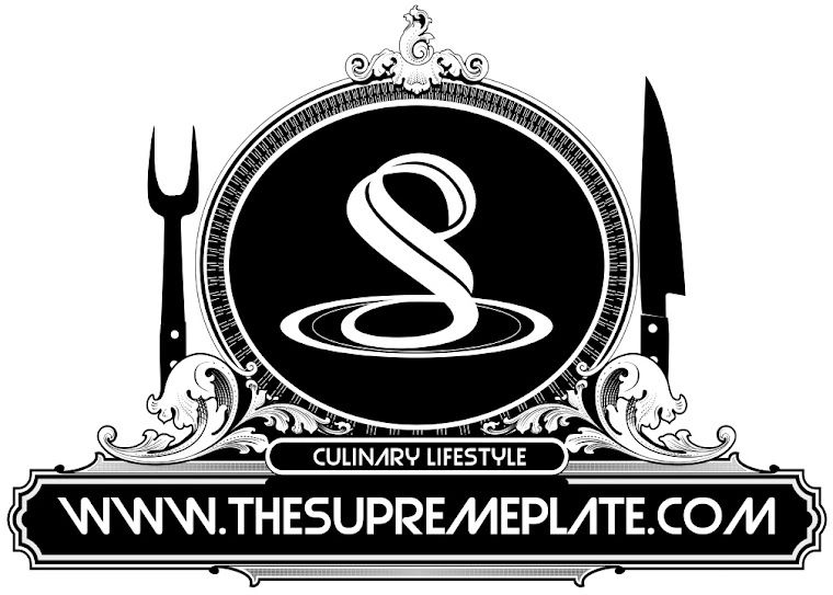 Stylized S on a decorative plate with a chefs knife and fork