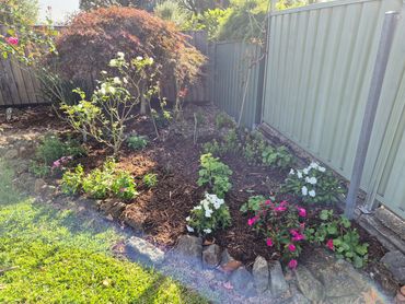 bark chip and weed garden for a client