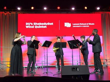 The ShakaduGAT wind quintet performs at an official University of Denver event