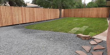 Cedar picket fence with pressure treated lumber. 3 year warranty. We concrete our posts and can even
