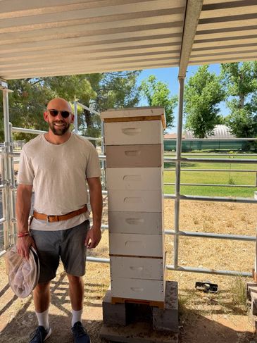 Chase Mitchell at the Gilbert Apiary