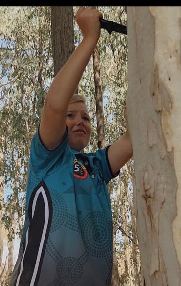 Young Fletcher, cutting Coolamons.