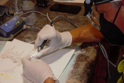 DW Dental Lab technician works on a restoration