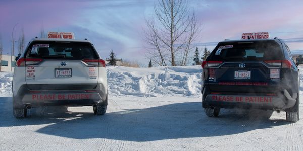 A pair of Toyota Rav 4 Limited-2021 in the snow