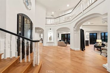 Large entryway with staircase