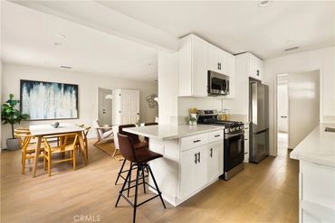 Kitchen, dining area, and living room