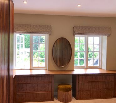 Dressing room with bespoke cabinetry.