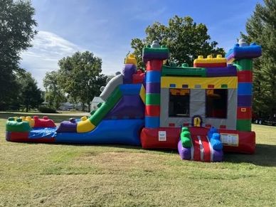 Expansive combo bounce house with slide offered by Cincinnati Bounce House Rentals, showcasing vibra