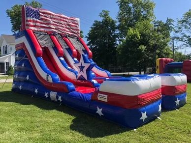 Patriotic American flag-themed water slide from Cincinnati Bounce House Rentals, perfect for summer