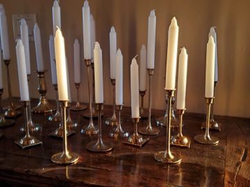 We purchase and add brass candlesticks to our inventory monthly.