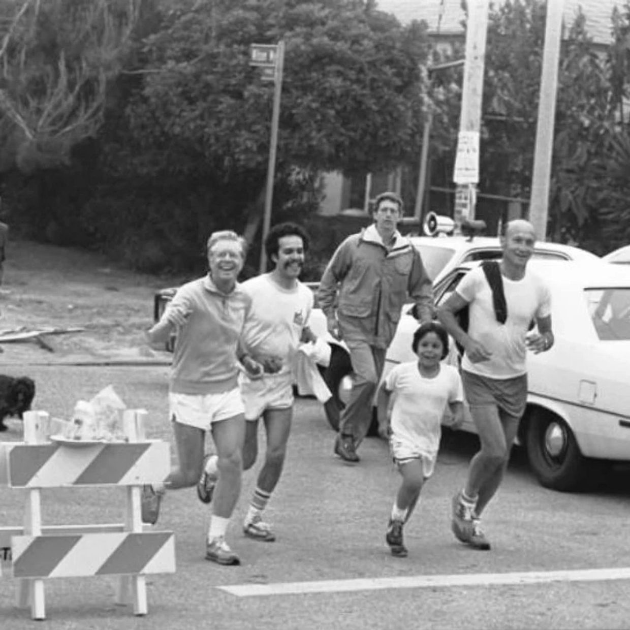President Carter takes an early morning run in El Sereno with his host Stephen Rodriguez (next to Ca