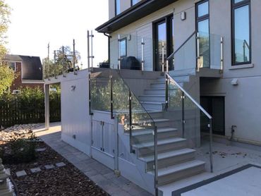 Deck Glass Railing Project Toronto. Stainless Steel Post and Handrails with tempered glass