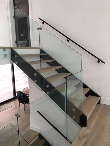 Glass Railings Toronto , the glass panels are secured with standoffs system