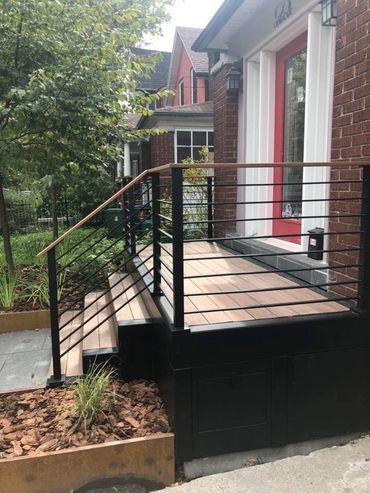 Stainless Steel Outdoor Railing with Wood Handrail.
