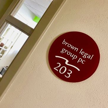 Brown Legal Group PC sign by office entry door
