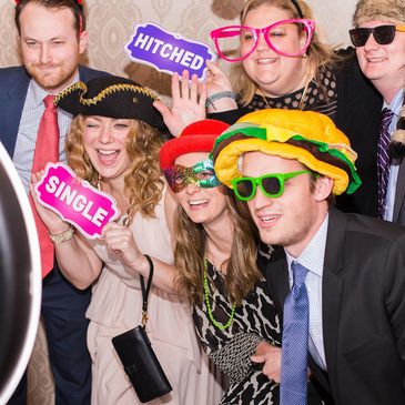 Guests posing at photo booth