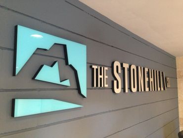 1" thick foam lettering with acrylic faces and contrasting edges. Installation on a feature wall.