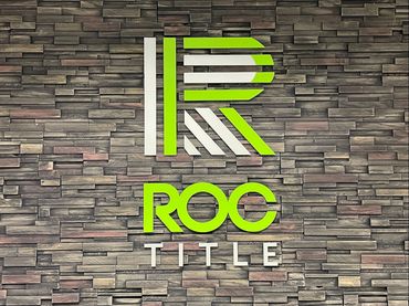 1/4" acrylic letters installed on textured accent wall using stand-off hardware.