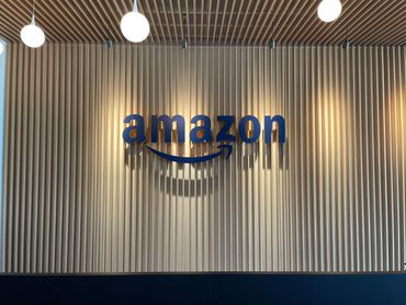 Non-illuminated channel letter installed onto wooden slats