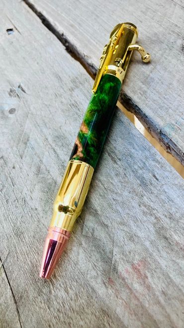 .30 caliber bolt action pen with green dyed boxelder Burl
