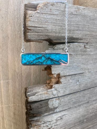 Turquoise inlayed mouthing necklace