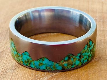 Titanium mountain ring inlayed with Santa Rita turquoise