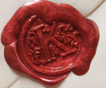 A Red Color Wax Stamp on Paper 