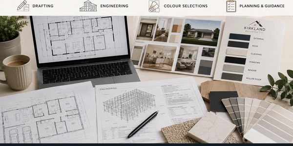 Architectural plans and color samples on a workspace.