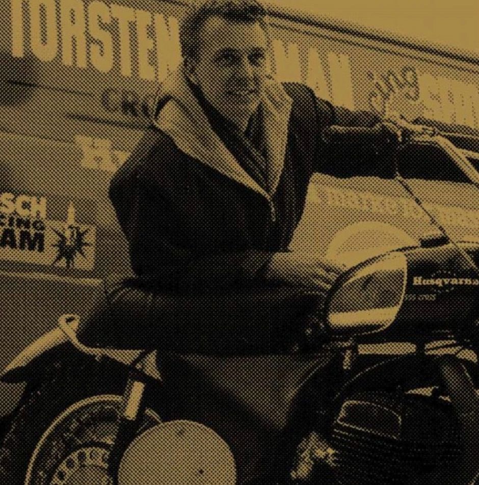 Torsten Hallman leaning on a motorcycle