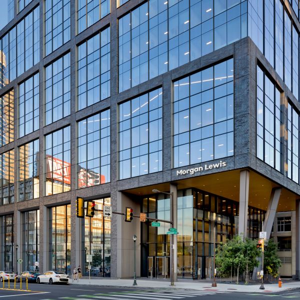 Modern Morgan Lewis office building with large glass windows.