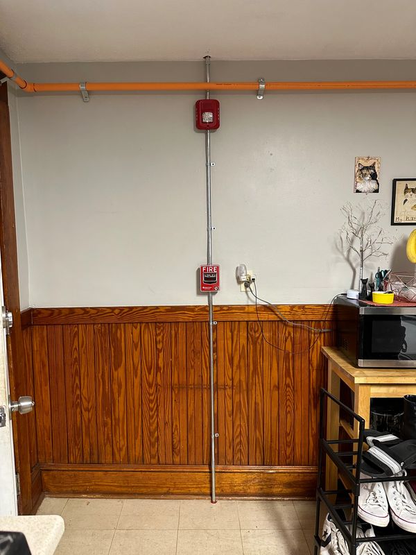 Fire alarm installation in an apartment building. Part of our commercial fire alarm systems services