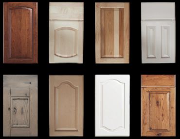 Various styles of wooden cabinet doors in different colors and finishes.