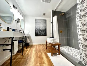 Install of flooring, shower tile, all wall decor, sinks, drywall and painting