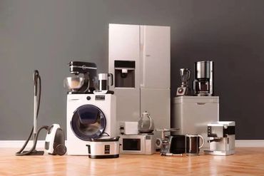 A collection of modern household appliances arranged together.